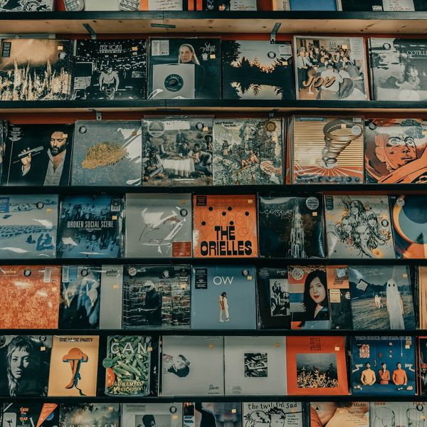 A wall covered with vinyl record sleeves